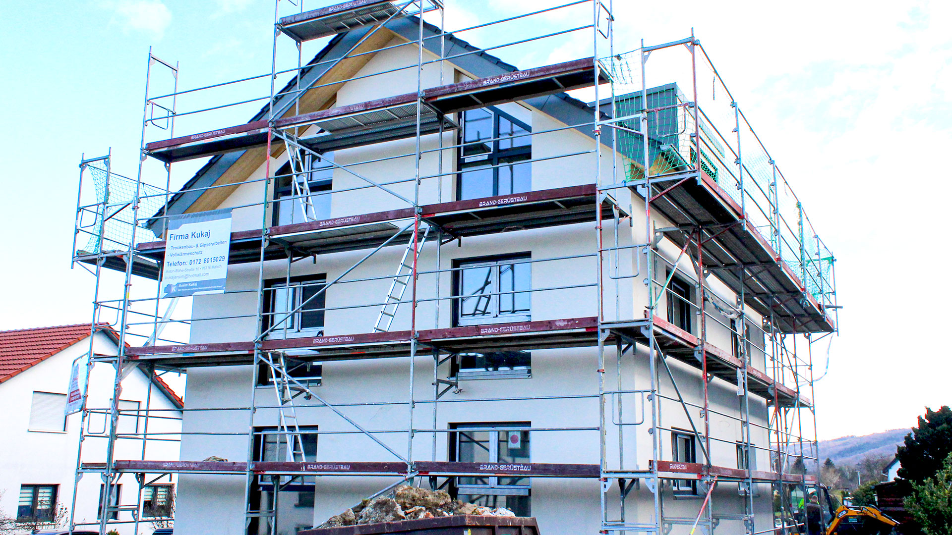 Sanierung und Dacherneuerung Zweifamilienhaus